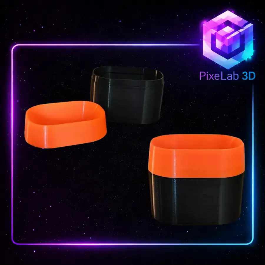 Contenedores modulares negros y naranjas impresos en 3D